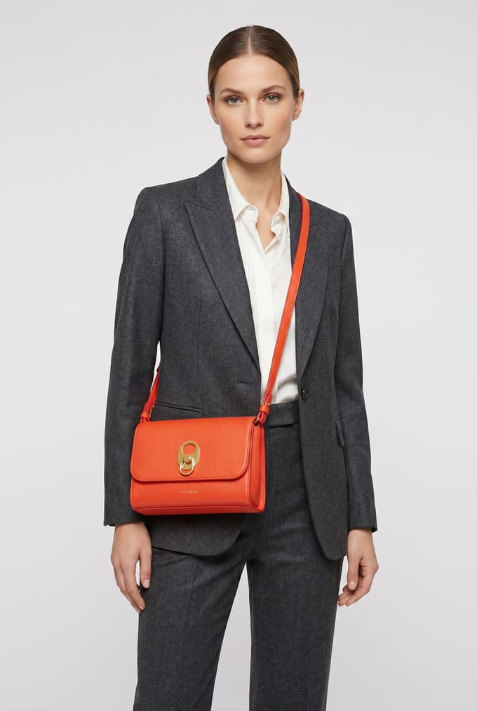 COCCINELLE Leren Schoudertas Dorian Mini Bag Grained Leather Gazpacho Oranje