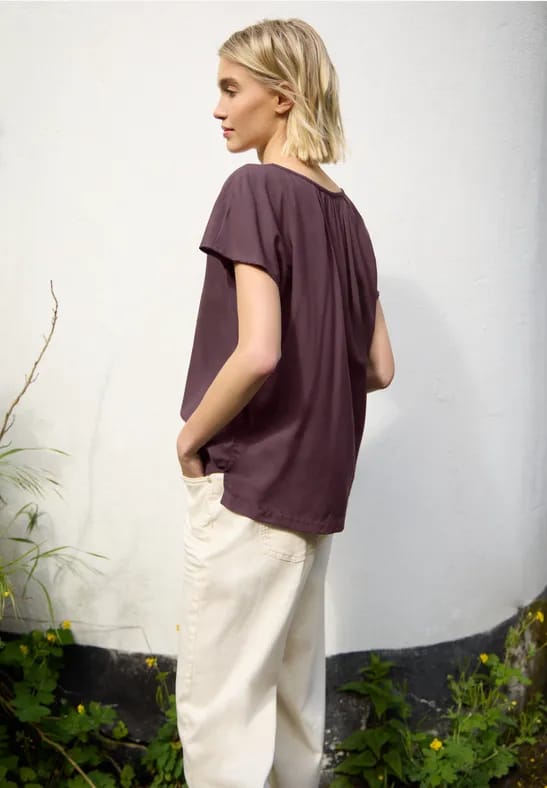 Blouse met hangende schouder en linten