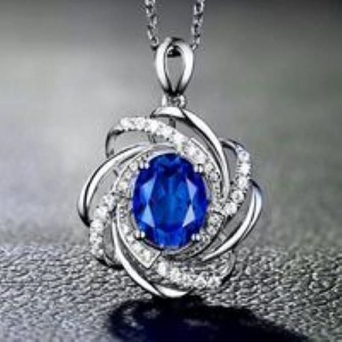 Ketting met hanger crystal blauw en steentjes