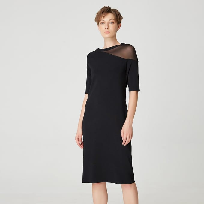 Minimalistische jerseyjurk met asymmetrisch snijden