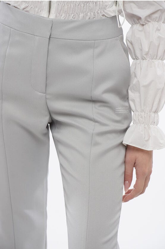 CORPORATE TECH-broek met split-enkel in grijs
