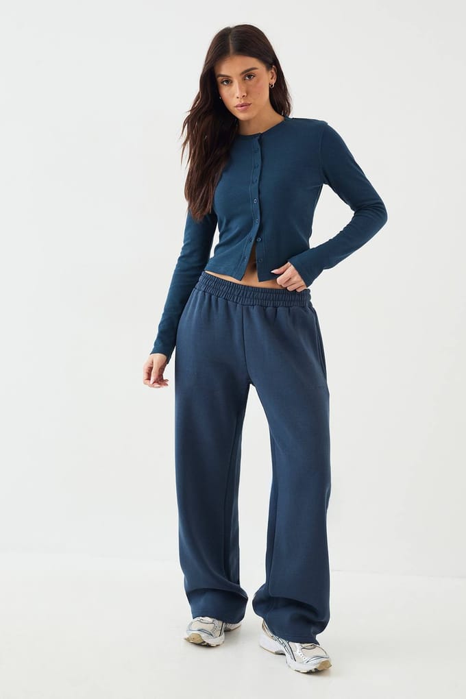 Dames DSGN Studio Doorknoop Ronde Hals Lange Mouw Top | Indigo | Maat: Medium