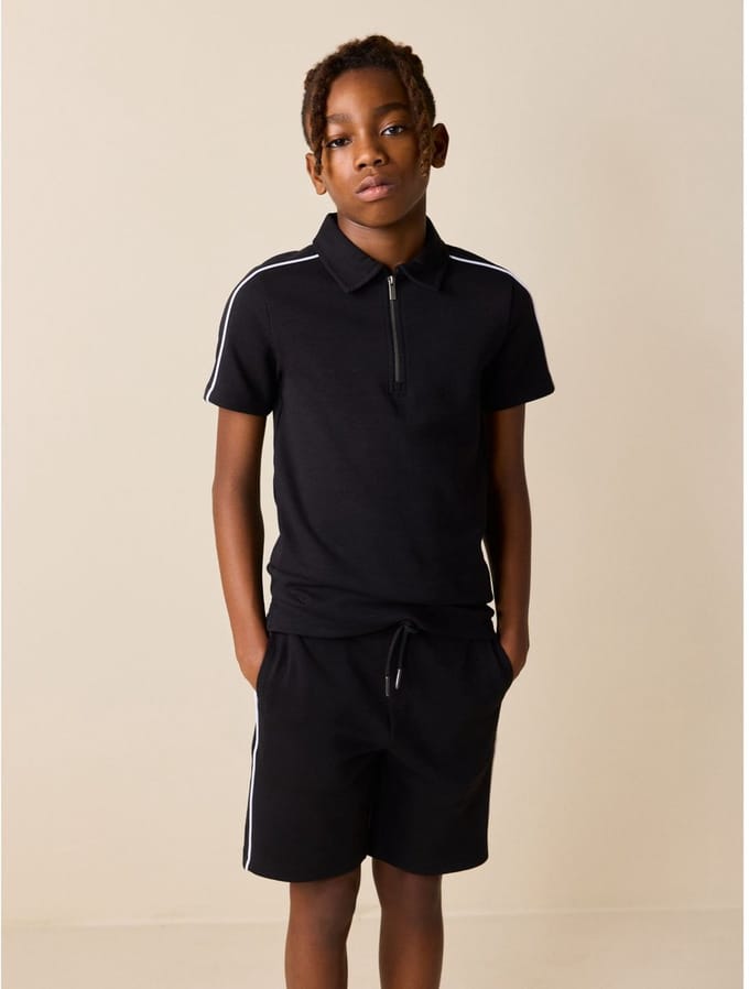 Next - Jongens - Set van poloshirt met rits aan de hals en short - Zwart
