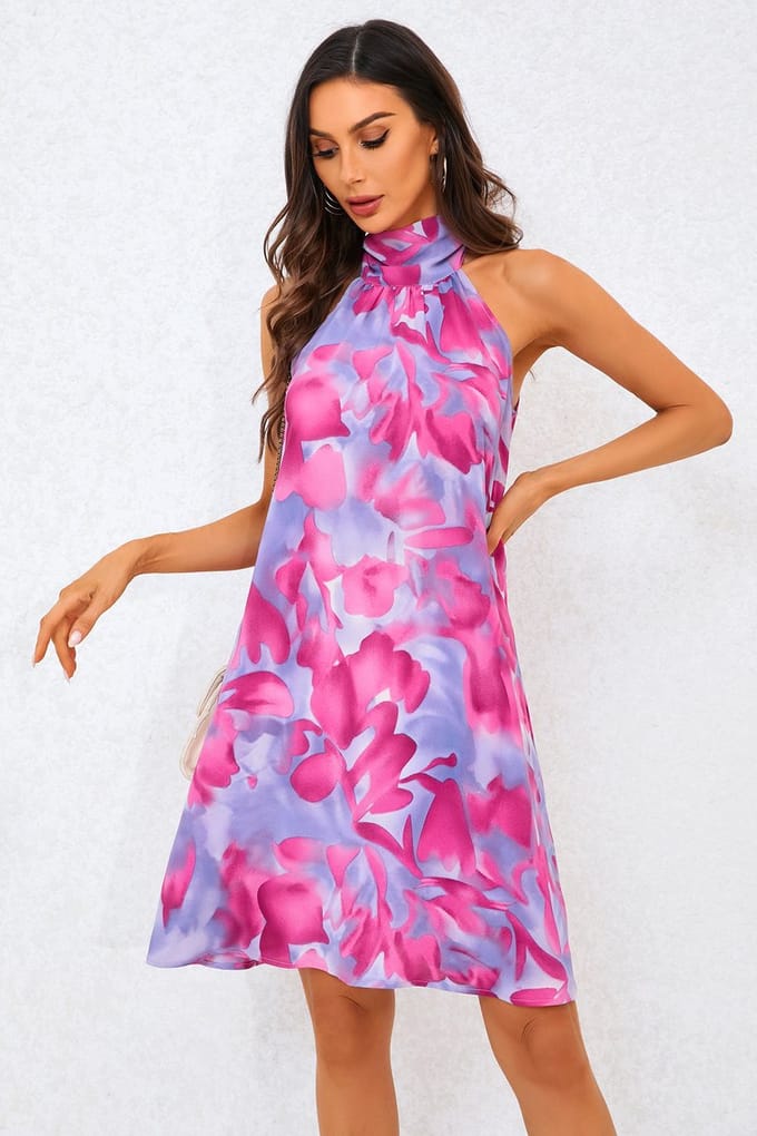 Abstracte bloemenprint halternek mini-jurk met strik op de rug in roze