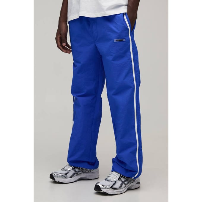 Relaxed Fit Side Stripe Logo Print Nylon Track Pants | Blue | Size Medium