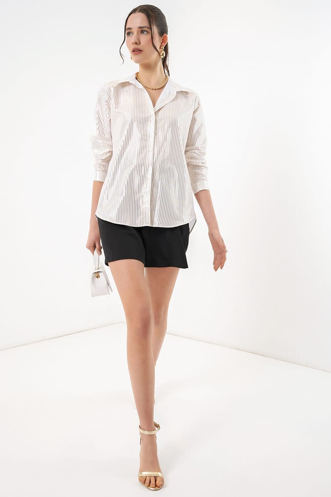 Oversized gestreepte blouse met knopen