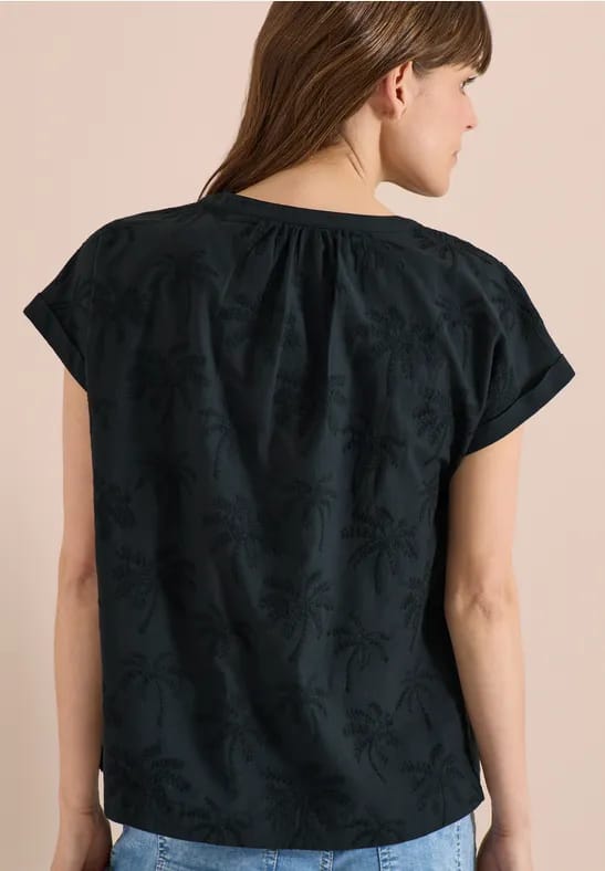 Blouse met hangende schouder en borduursel