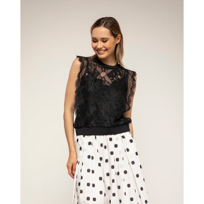 Semitransparante kantentop met elastische taille