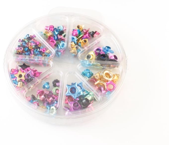 406 Scrapbooking Eyelets, verschillende kleuren en 8 verschillende vormen