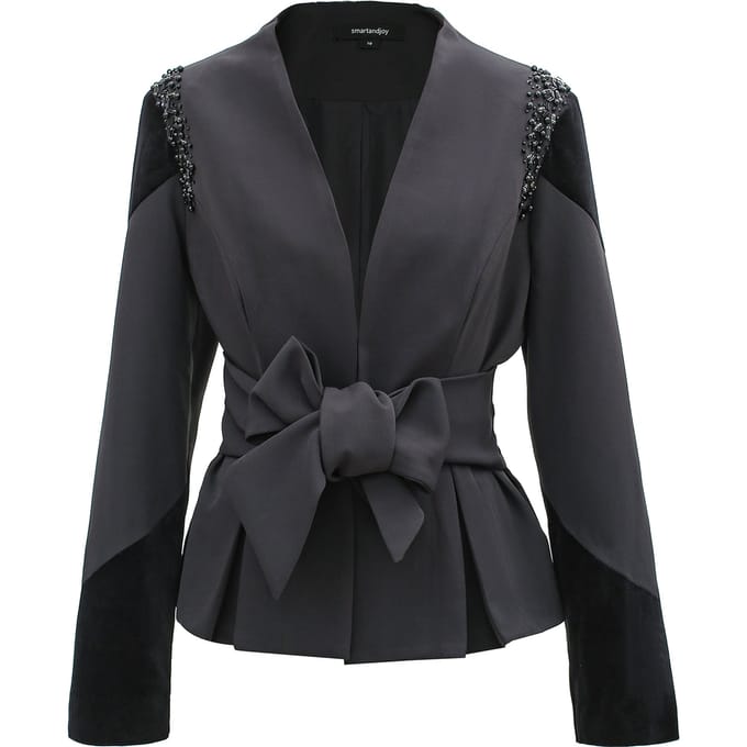 Bi-materiaal blazer en geknoopt riem