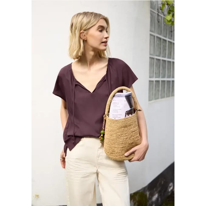 Blouse met hangende schouder en linten