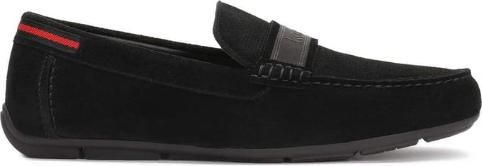 Black suede moccasins embellished with logo ribbon