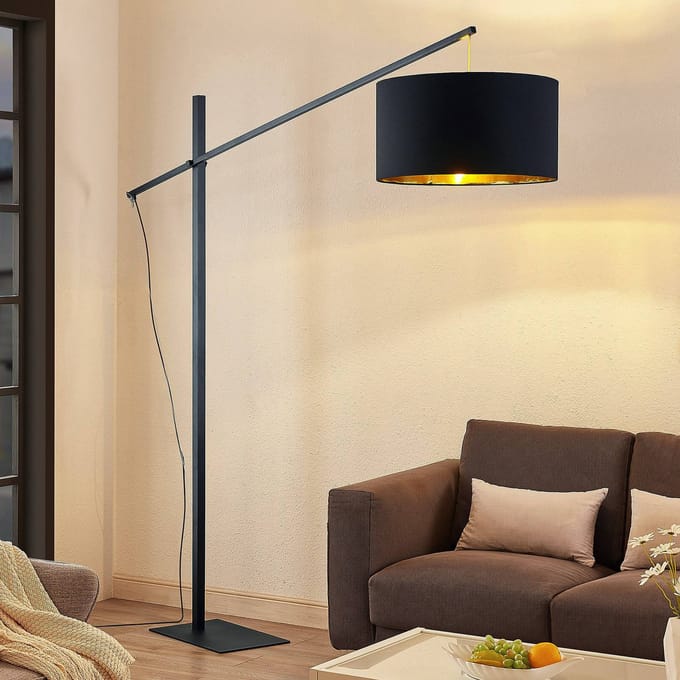 Arcchio gebogen vloerlamp Mossa, 200 cm, zwart-goud, textiel