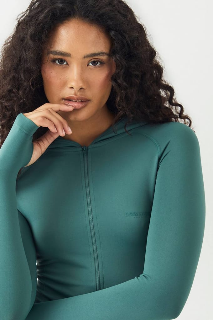 Dames DSGN Studio Sport Ultra Contour Naadloze Capuchon Sportjack | Groente | Maat: Medium