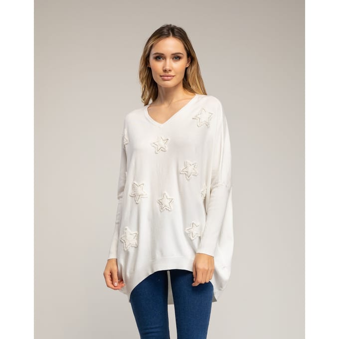 Oversized lange gebreide trui met opgetikte stoffen sterren met strass.
