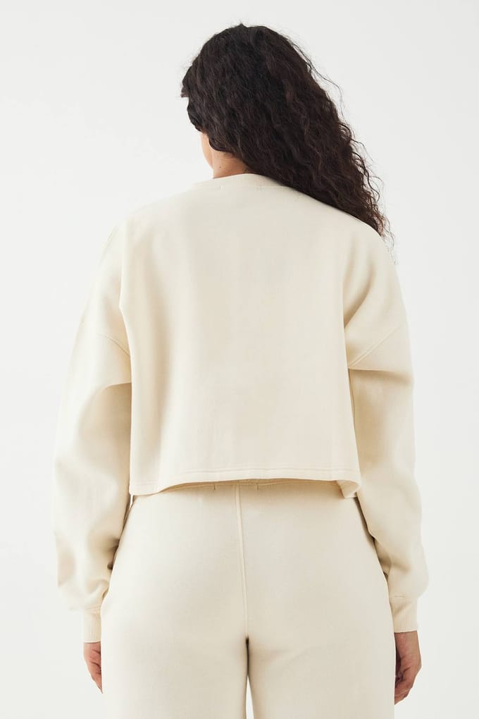 Dames DSGN Studio Doorknoop Sweatshirt | Creme | Maat: Medium