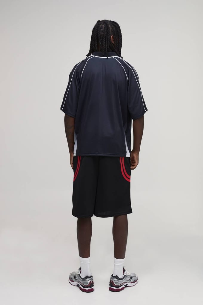 Ruimvallende Mesh Varsity Jersey Shorts | Black | Size Medium