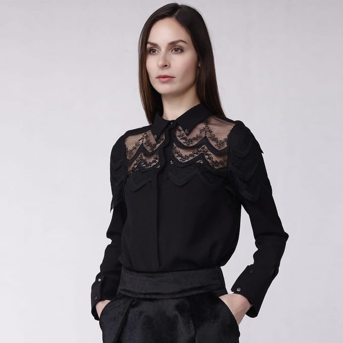 Geschulpte rand kanten shirt