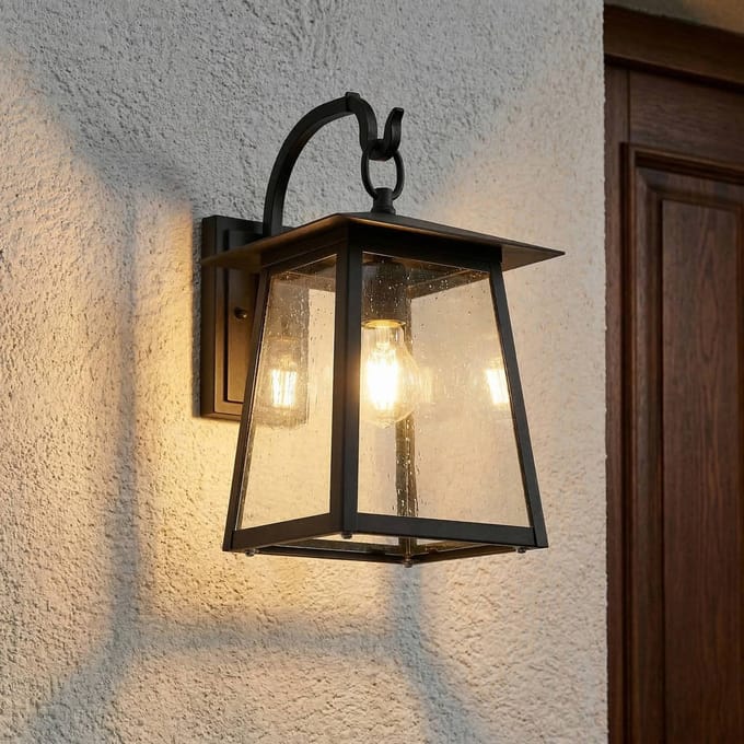 Lucande buitenwandlamp Xavon, zwart, lantaarn, E27, IP44