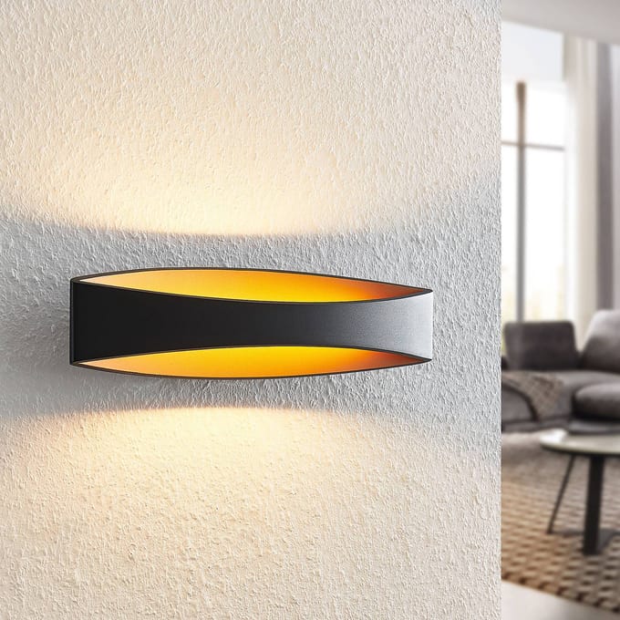 Arcchio LED wandlamp Jelle, 44 cm, zwart/goud, omhoog/omlaag