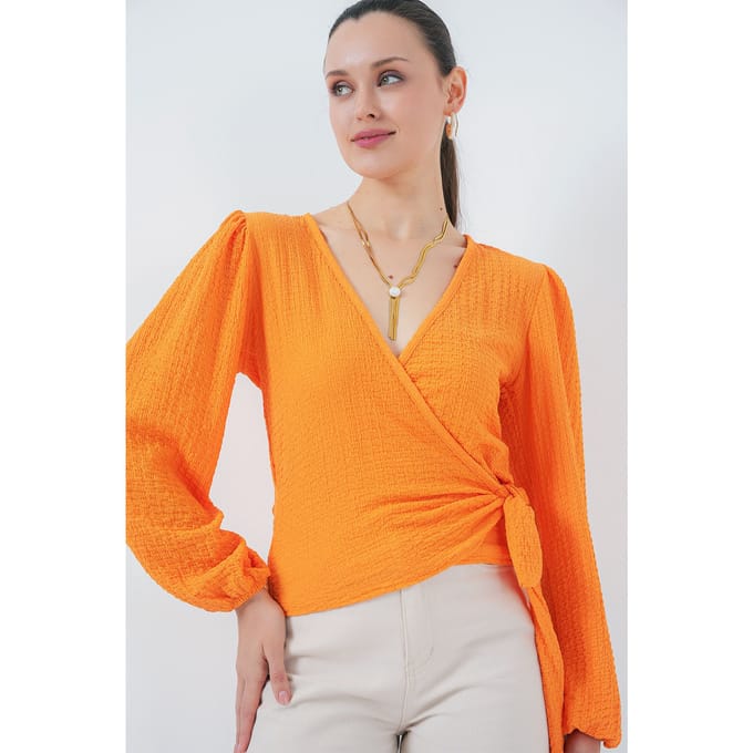 Textuur V-hals Blouse met Pompom en Striksluiting