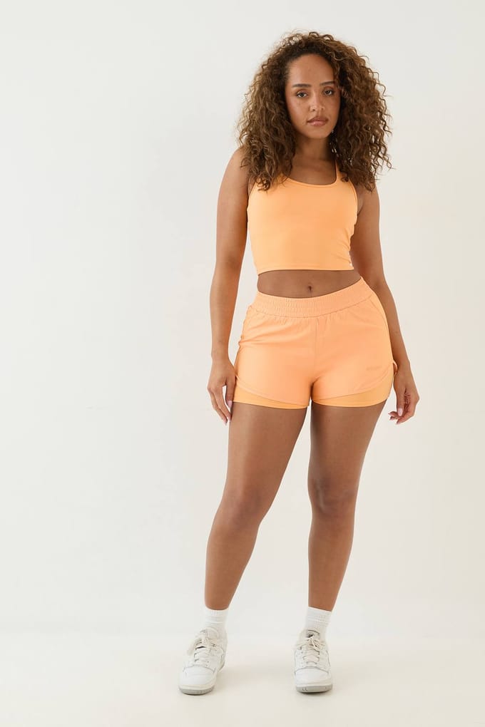 Dames Dsgn Studio Hoge Taille 2-in-1 Hardloopshort | Orange | Maat: XS
