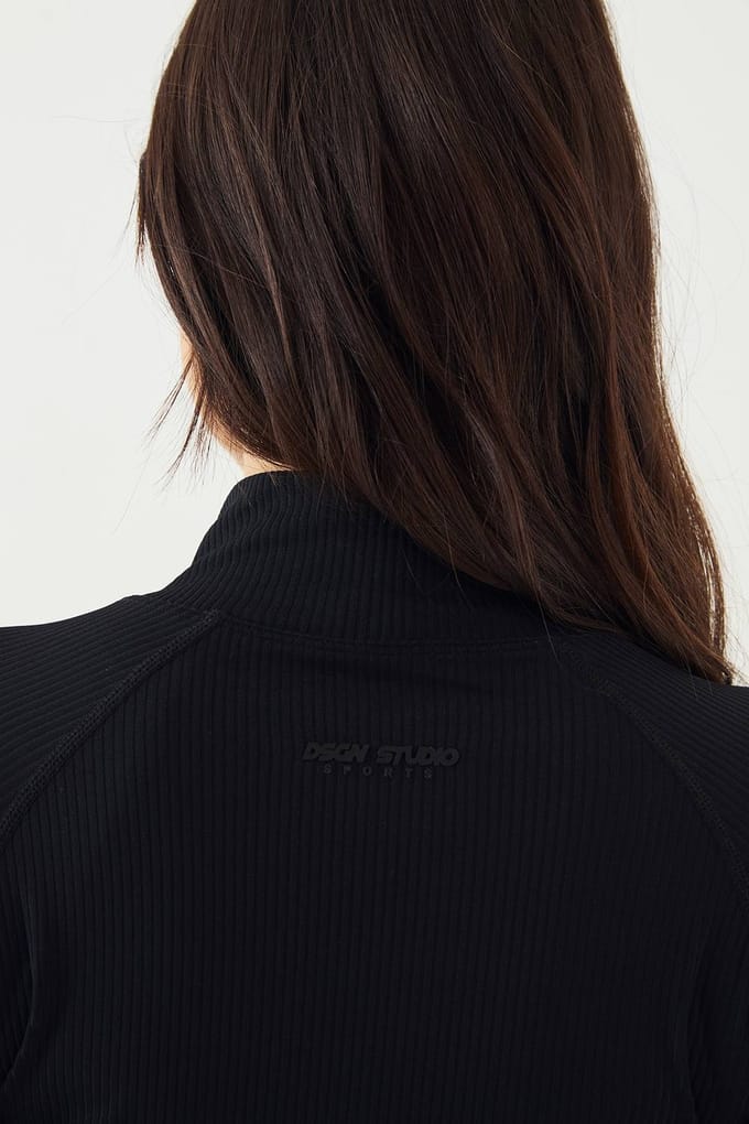 Dames DSGN Studio Ultra Sculpt Sportjack met Geribbelde Naaddetails | Zwart | Maat: Medium