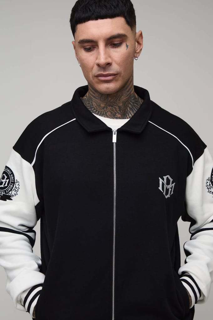 Lang Boxy Fit Jack Met Kraag En Kleurblokken In Varsity Jersey Stijl | Black | Size Medium