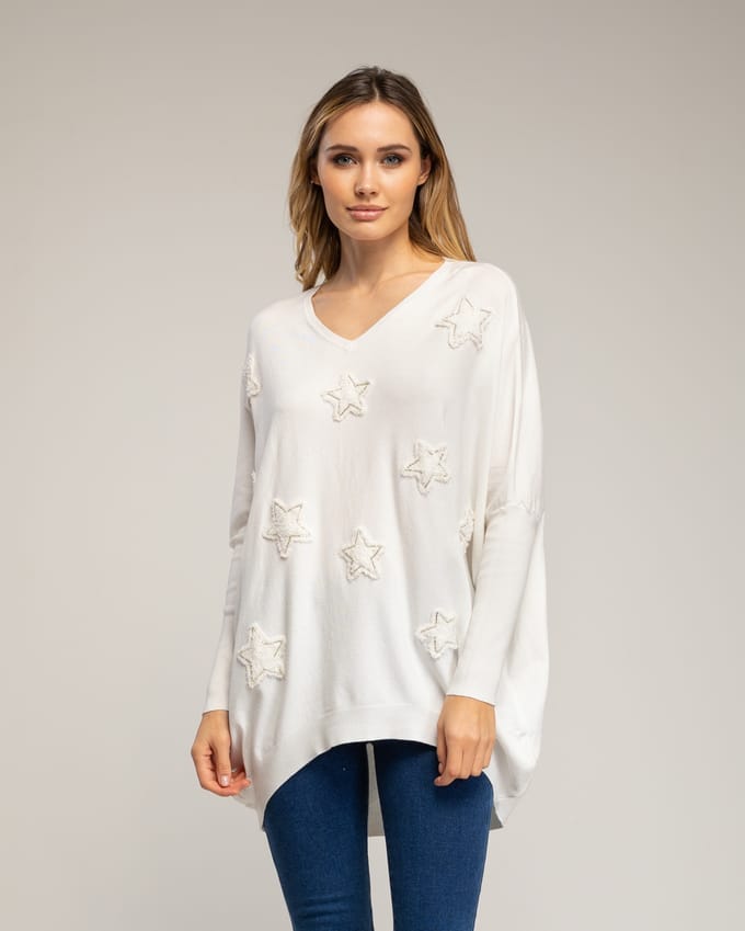 Oversized lange gebreide trui met opgetikte stoffen sterren met strass.