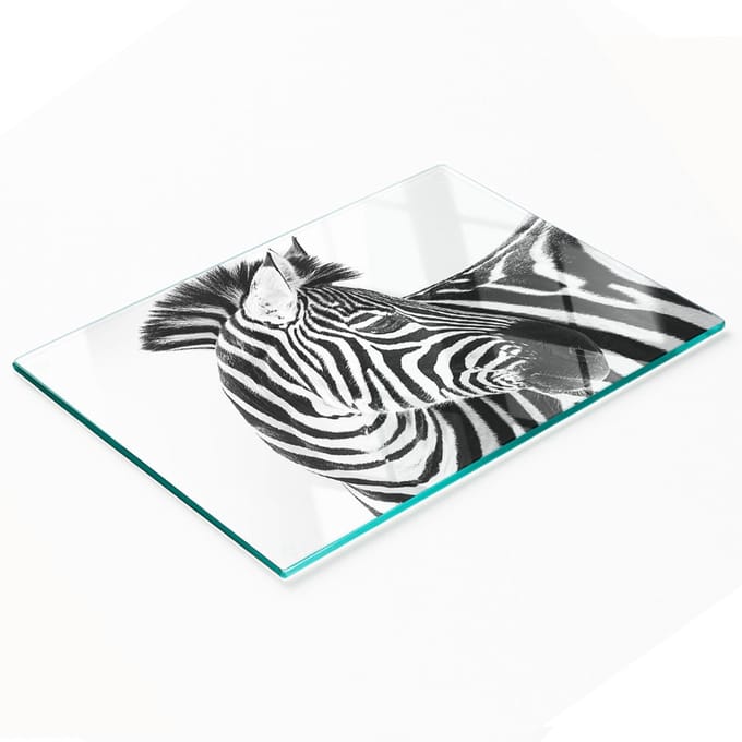 Glazen snijplank met zebraprint in de sneeuw, 80x52 cm