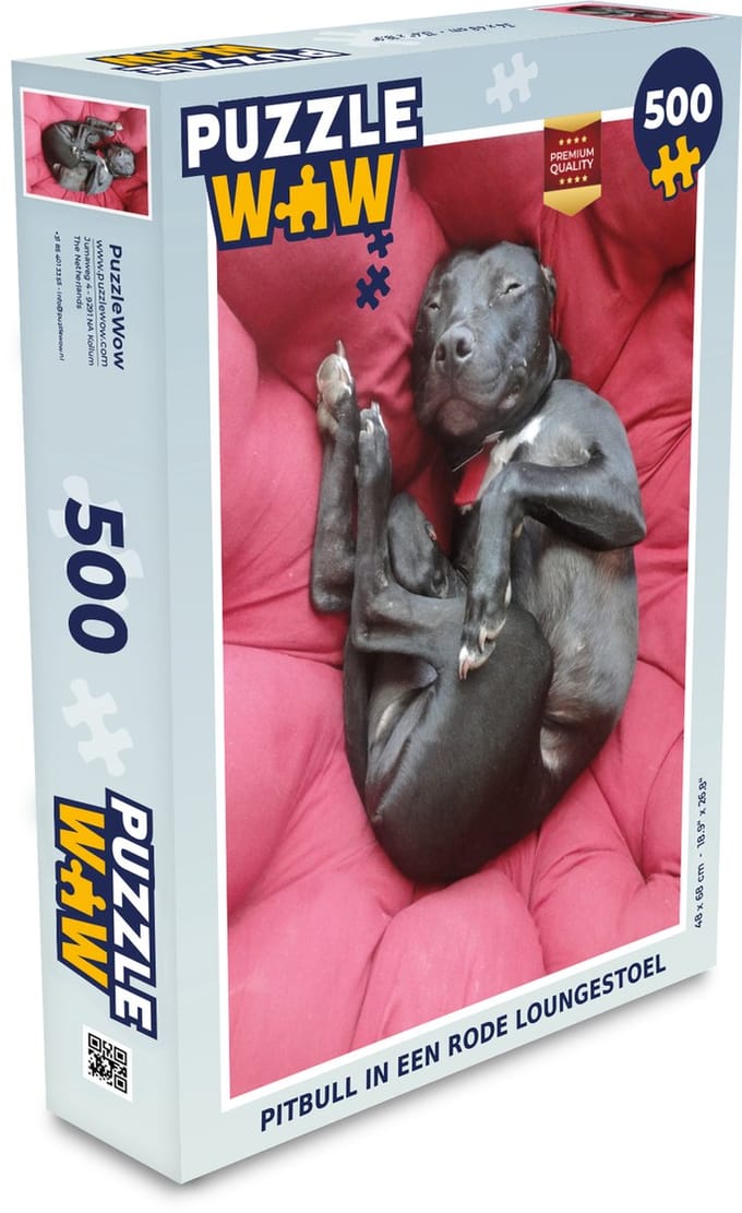 Puzzel Pitbull in een rode loungestoel - Legpuzzel - Puzzel 500 stukjes