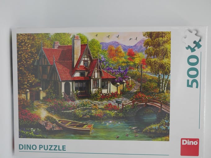 Dino Puzzel van een nostalgisch huis aan het water, 500 stukjes.