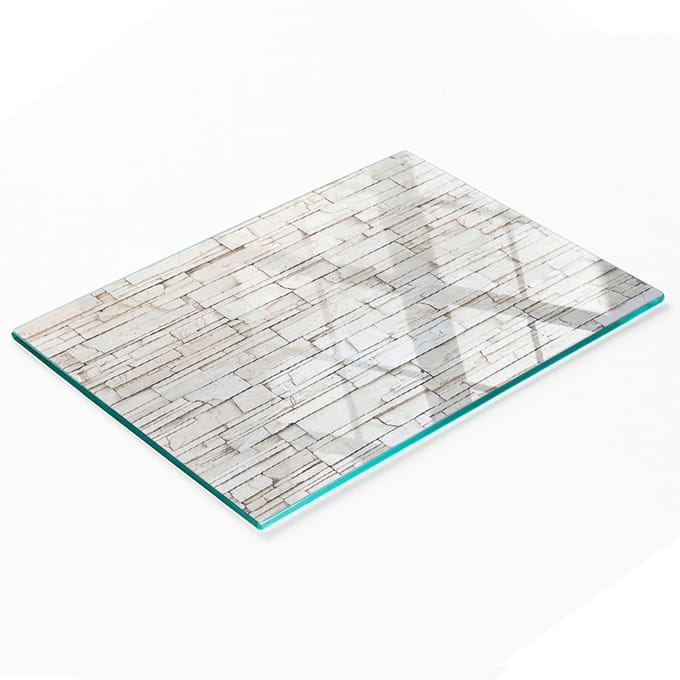 Decoratieve glazen keukensnijplank met witte stenen muurprint, 80x52 cm