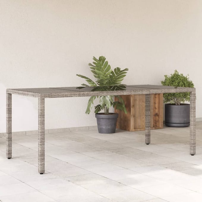 vidaXL Tuintafel met glazen blad 190x90x75 cm poly rattan grijs