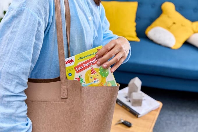 Haba educatief spel Leo de Feestleeuw - kleurrijk kinderspel karton.
