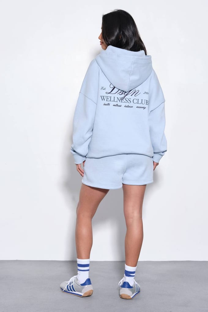 Dames Dsgn Studio Wellness Club Oversized Hoodie Korte Broek Trainingspak | Lichtblauw | Maat: Small