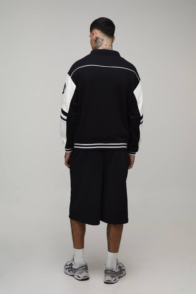 Lang Boxy Fit Jack Met Kraag En Kleurblokken In Varsity Jersey Stijl | Black | Size Medium
