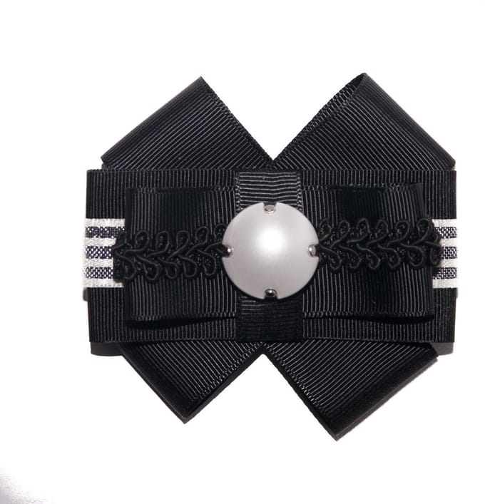Stijlvol modeaccessoire: Broche /Strikje / Speldje / Patch...