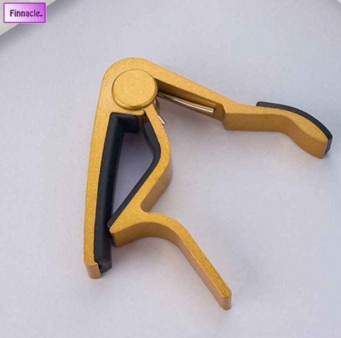 Finnacle - Speelgoedinstrument - Gitaar Capo met grip - Metallic Gold