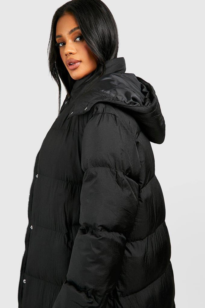 boohoo Dames Longline Pufferjas met Capuchon | Zwart | Maat: 42