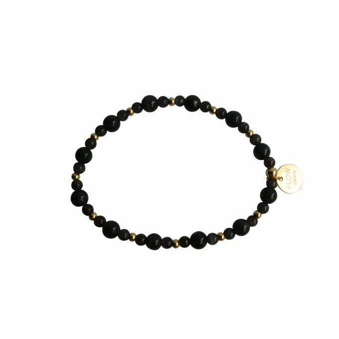 FlowJewels - armband - staal - cats eye - goudkleurig - elastisch - handgemaakt