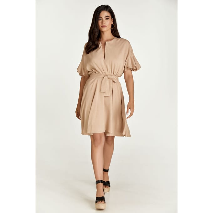 Beige jurk met ruches