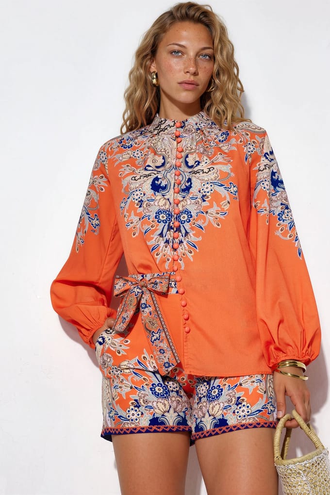 Pijlen geweven playsuit met strikdetail