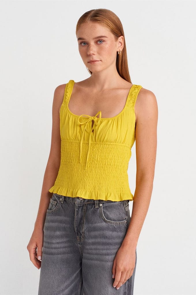 Getailleerde Cropped Mouwloze Blouse met Strikvoorkant