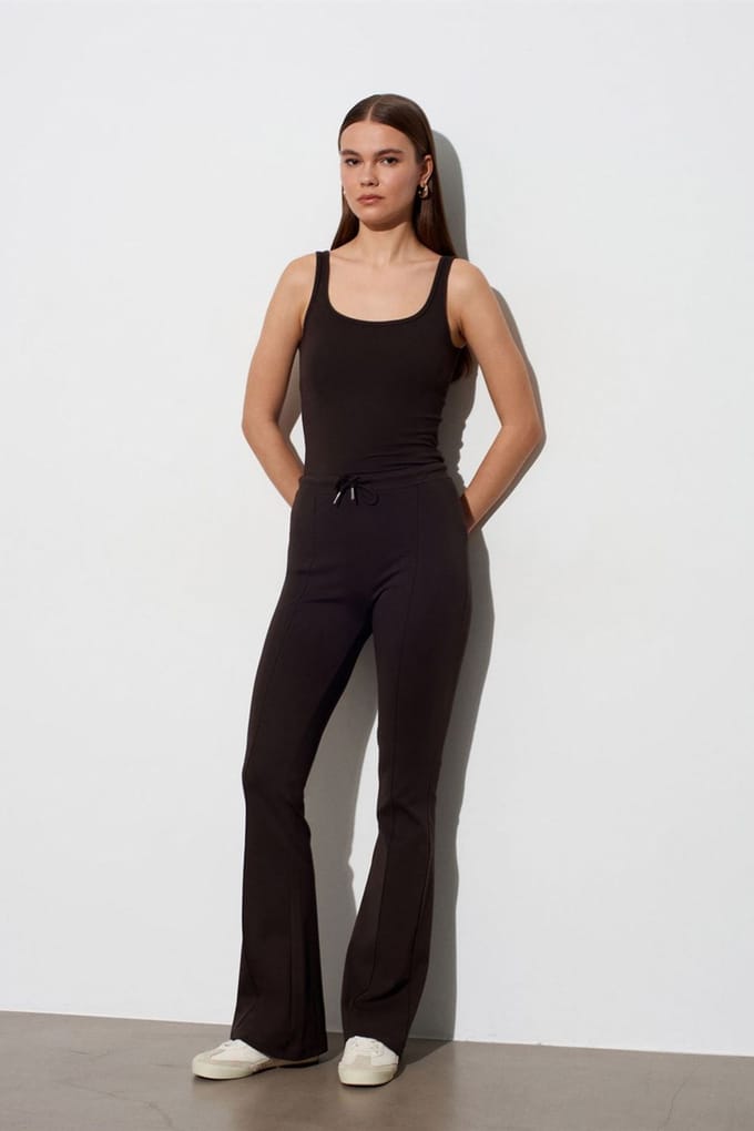 Midden taille flare jerseybroek met trekkoord
