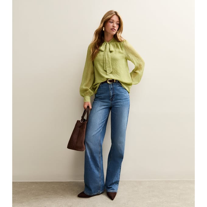 Groene top met strik en lange mouwen