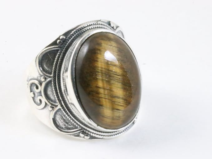 Bewerkte zilveren ring met tijgeroog - maat 19