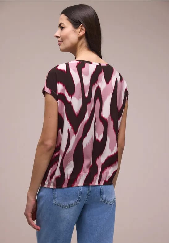 Blouse met overhangende schouders en getapete details
