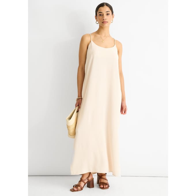 Beige oversized jurk met bandjes aan de achterkant