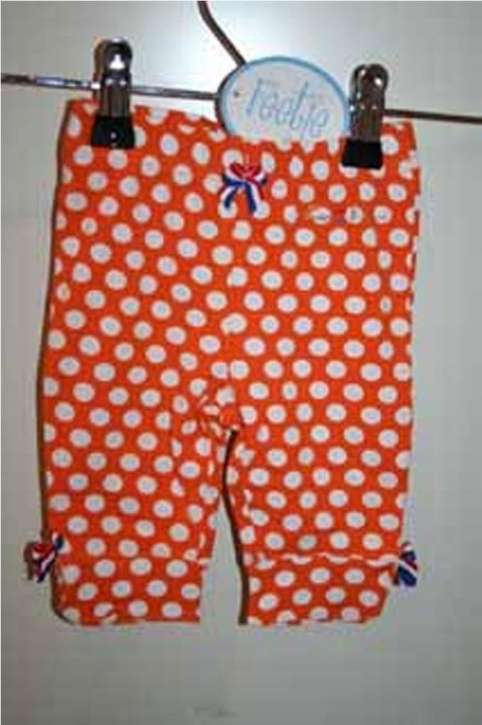 Feetje legging capri oranje stip maat 74
